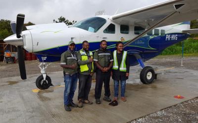 Noor Hilapok (second from right) became a captain and did his first solo flight in Papua, with Frontier Aviation
